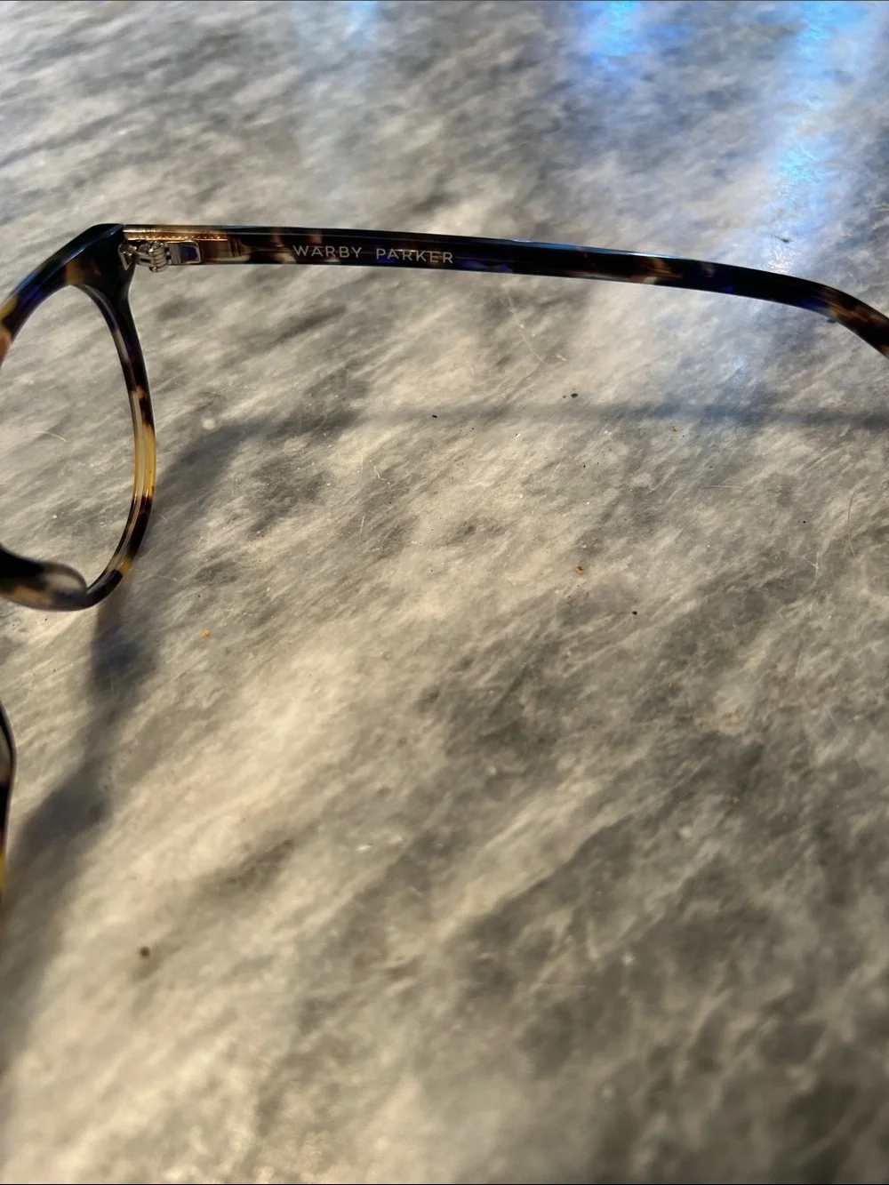 Warby Parker Tortoiseshell Round Glasses - Brown & Black Model is Blakey